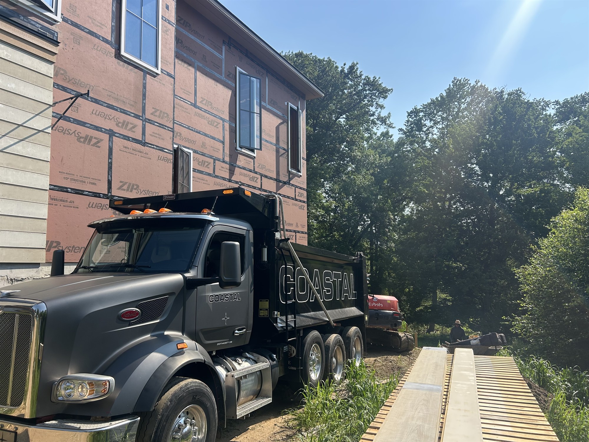 CLH Peterbilt dump truck hauling on a Connecticut job site
